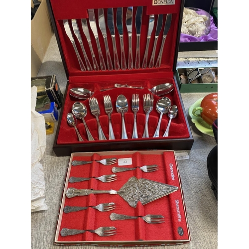 33 - A cased Onieda canteen of cutlery (appears complete) along with a silver plated cake fork set