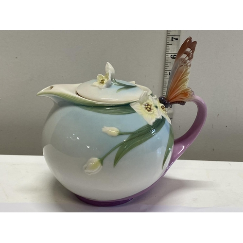 2 - A Franz Porcelain tea set decorated with butterflies (No damage)