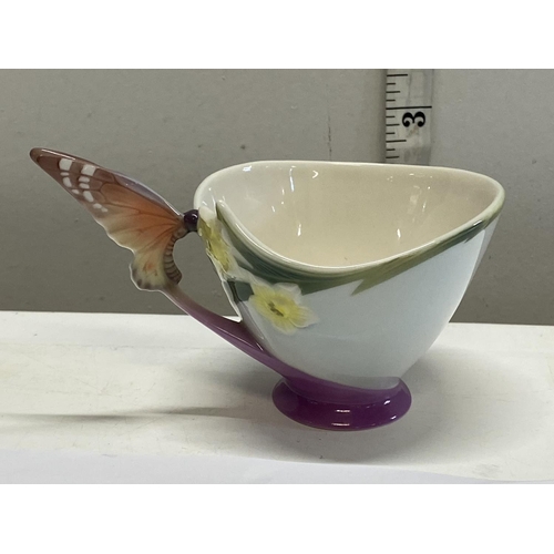 2 - A Franz Porcelain tea set decorated with butterflies (No damage)