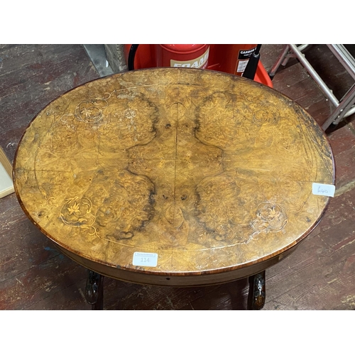 114 - A antique Burr Walnut sewing table (slight imperfections to top), shipping unavailable