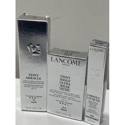 334 - Three assorted Lancome cosmetics