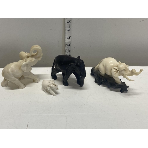 356 - A selection of assorted carved elephants