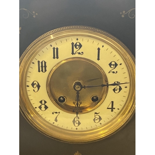 389 - A heavy slate mantle clock by ALM with key and pendulum, shipping unavailable