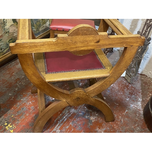 397 - A antique X framed oak bishops chair with red leather insert, shipping unavailable