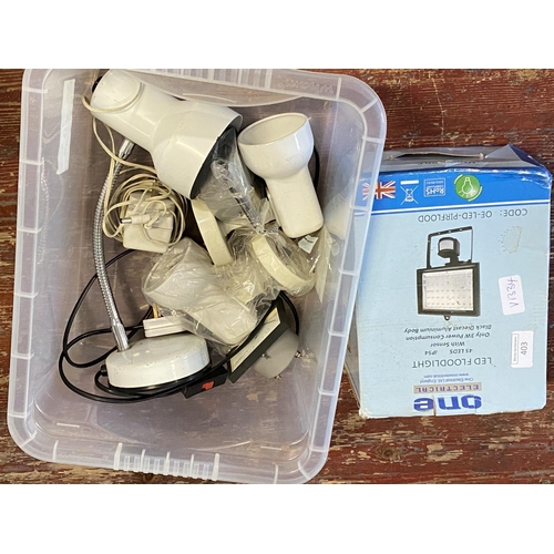 403 - A selection of assorted light fittings and new boxed LED floodlight