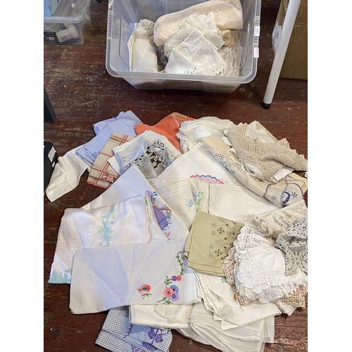 404 - A large selection of assorted vintage linen and other materials