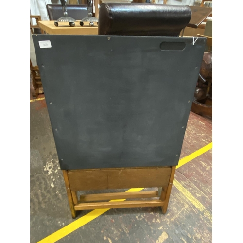 365 - A 1940/50 child's wooden folding chalkboard, shipping unavailable