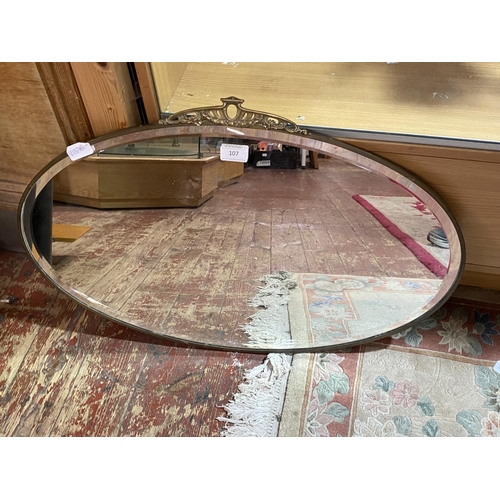 107 - A vintage oval hall mirror 70x46cm, shipping unavailable