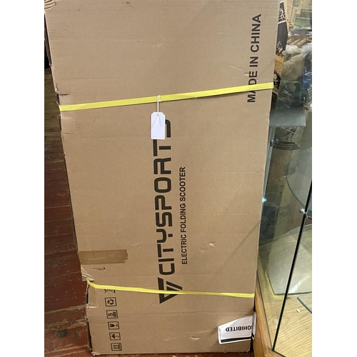 132 - A new boxed electric folding scooter (unchecked), shipping unavailable