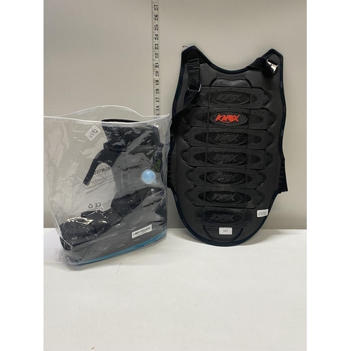 163 - A new large medical boot and front chest guard