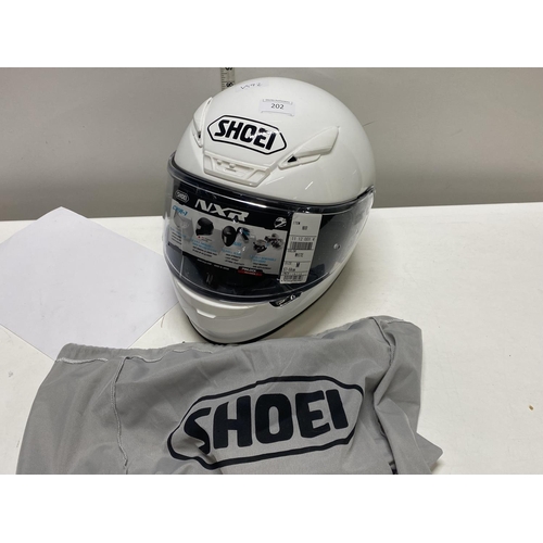 202 - A new Shoei crash helmet size M