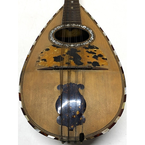 29 - A early 20th century cased Marco Rebora mandolin with inlay detail