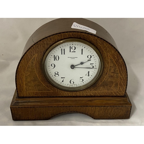 43 - A vintage Dyson and Son of Leeds oak cased mantle clock