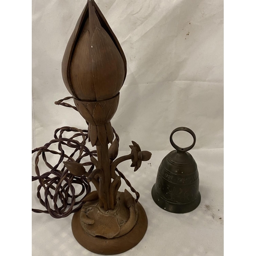 51 - A brass bell and a novelty wooden table lamp a/f