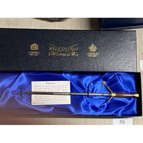 59 - A boxed Wilkinson's Sword miniature Claymore sword