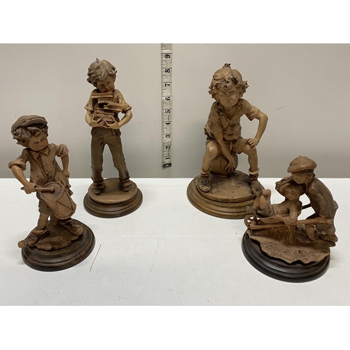 61 - Four Giuseppe Armani resin figures on wooden bases