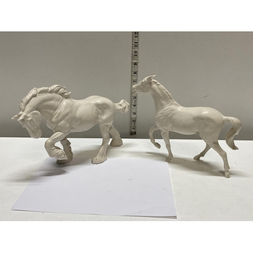 62 - Two Royal Doulton white ceramic horses