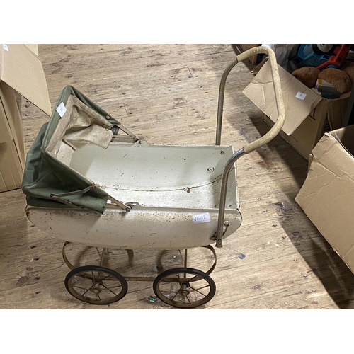 83 - A vintage child's Triang pram Shipping unavailable