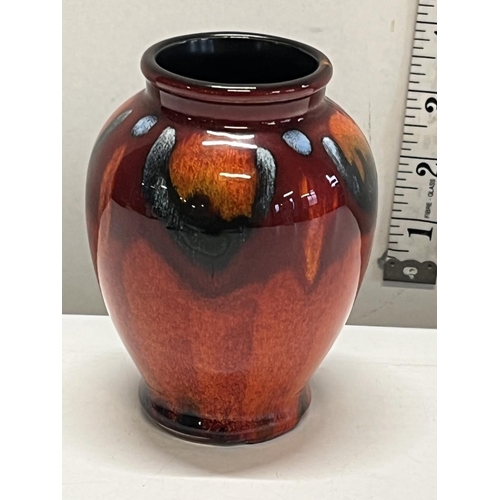 319 - A collectable Poole pottery small vase h11cm