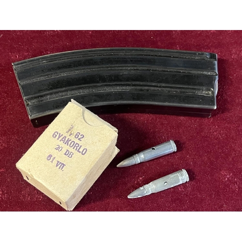 345 - A German HK rifle magazine and a box of soviet dummy ammunition