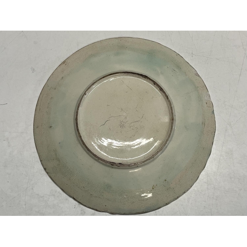 403 - A Victorian Majolica plate with relief in Celtic design