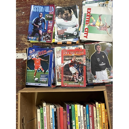 243 - A job lot of vintage football annuals and assorted football programmes and etc. Shipping unavailable