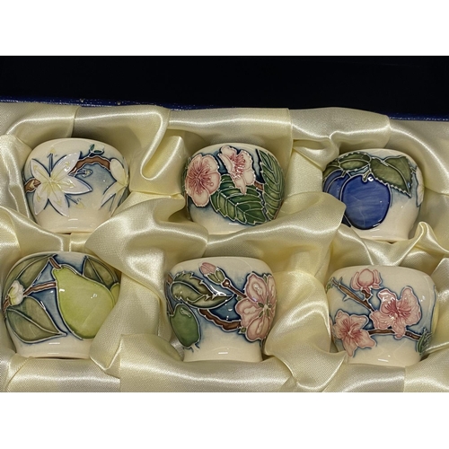 118 - A boxed limited edition Moorcroft set of six 2003 Easter Egg cups