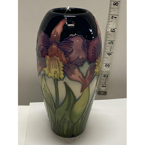 121 - A boxed limited edition Moorcroft vase by Nicola Slaney 63/100 entitled 'Orchid' h19cm