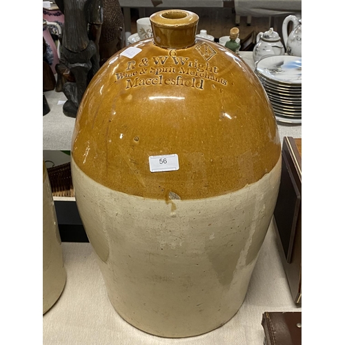 56 - A large heavy salt glazed earthenware wine flagon R and W Wright of Macclesfield h55cm, shipping una... 