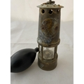 A miniature miners lamp and pressure balloon