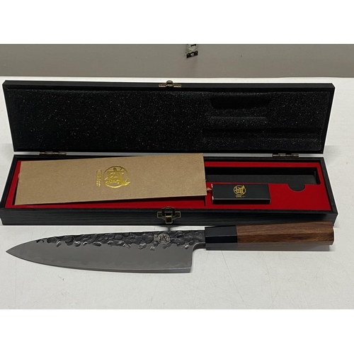 275 - A boxed Japanese kitchen knife