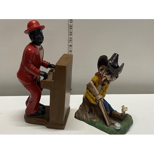 318 - A vintage ceramic figure and a wooden figure of a cowboy