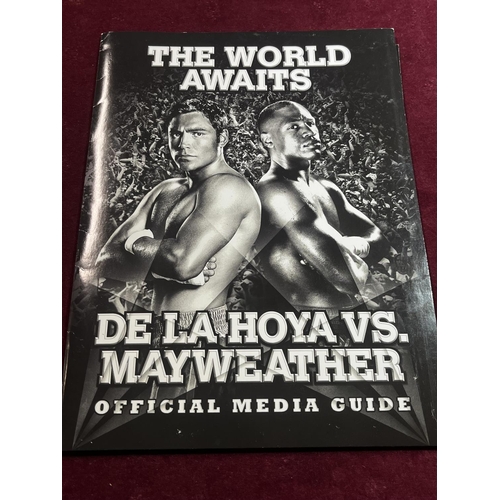 312 - A hand signed Oscar de la Hoya VS Floyd Mayweather Junior media pack with hand signed contents and C... 