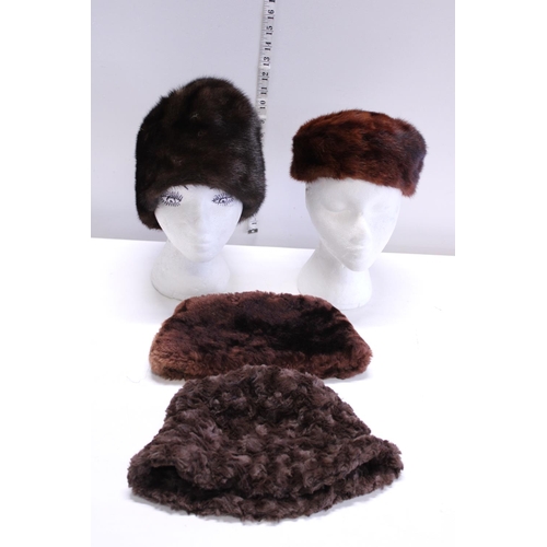 325 - Four vintage fur hats