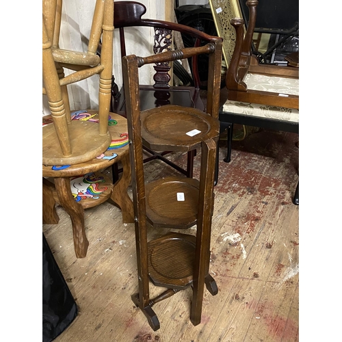 103 - A three tiered mahogany cake stand.  shipping unavailable