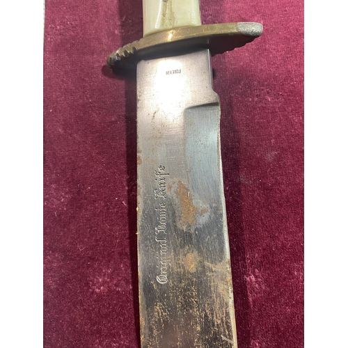 143 - An original Bowie knife with a bone handle in a native American Indian style sheath. Blade length 25... 