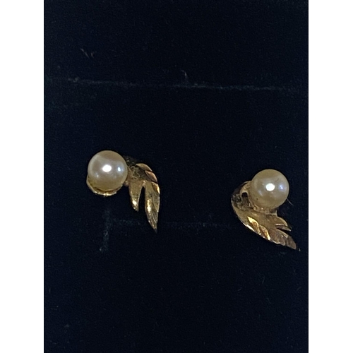 150 - A pair of tests for 9ct  gold & pearl earrings.