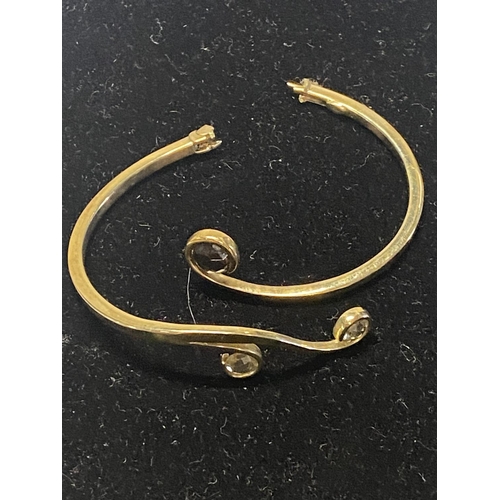 161 - A 9ct gold bangle (broken) weight 12.09 grams.