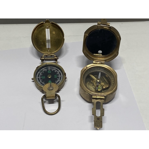 164 - Two military style compasses.