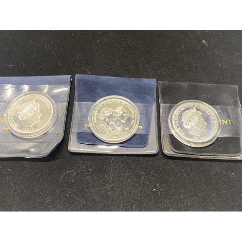 173 - Three assorted collectable £5 proof coins