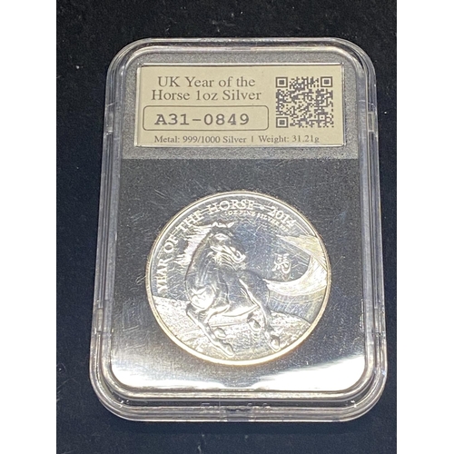 176 - A solid silver £2 proof coin for the 2014 year of the horse.