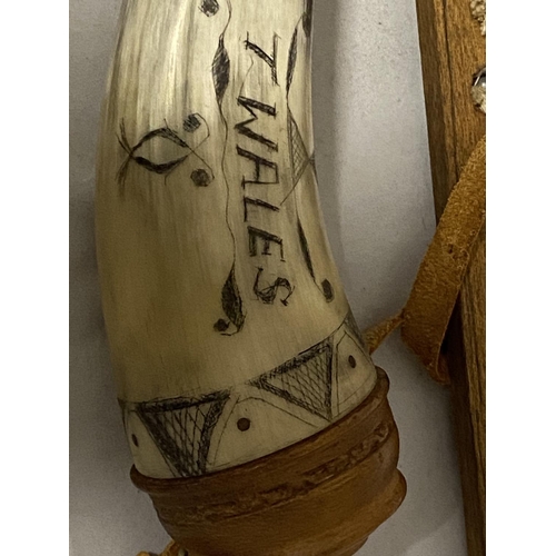 18 - Two vintage black powder horn flasks