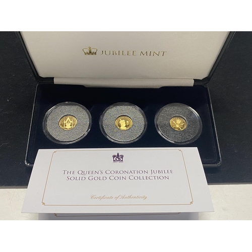 183 - A limited edition cased set of three 9ct gold proof coins celebrating the Queen's Coronation jubilee... 