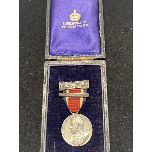 198G - A cased silver 1912 King George V medal.