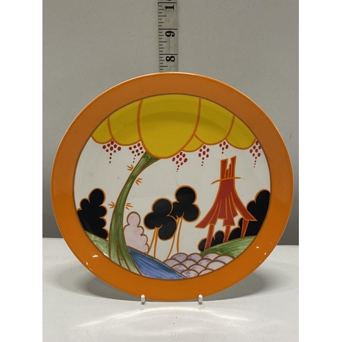 206 - A commemorative Wedgwood plate in appreciation of Clarice Cliff and her Bizarre range