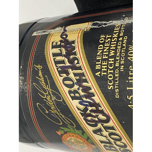 220 - A unopened bottle of Black Bottle Scotch whisky 4.5 litres 1993. Signed by Sir Alex Ferguson and awa... 