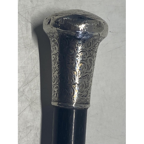 266 - A hallmarked silver topped walking cane.  shipping unavailable