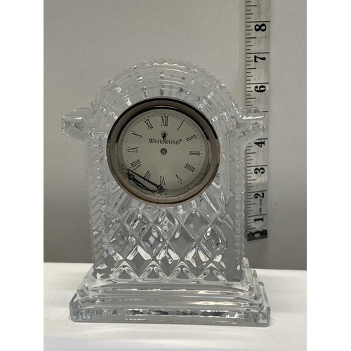 284 - A heavy Waterford crystal clock (clock needs attention) 18cm tall