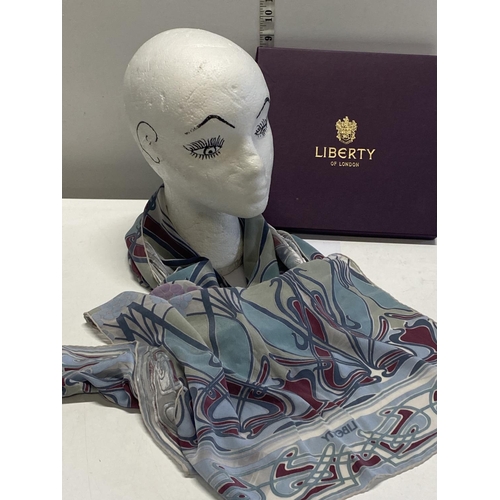 292 - A boxed Liberty silk scarf. A few marks to the box.