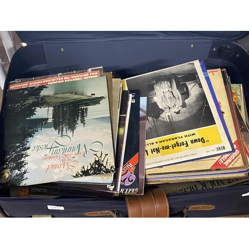 295 - A suitcase full of mixed genre LP records